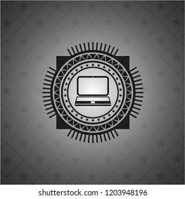 laptop icon inside dark emblem