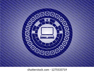 laptop icon inside emblem with jean texture
