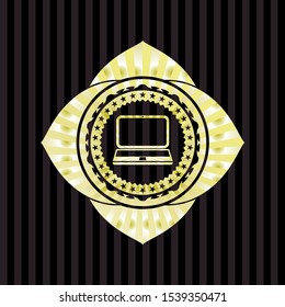 laptop icon inside gold emblem