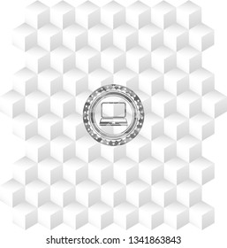 laptop icon inside grey badge with geometric cube white background