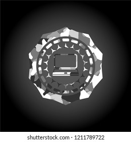 laptop icon inside grey camouflage emblem