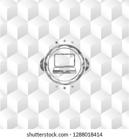 laptop icon inside grey emblem with cube white background