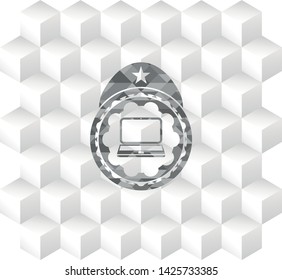 laptop icon inside grey icon or emblem with geometric cube white background