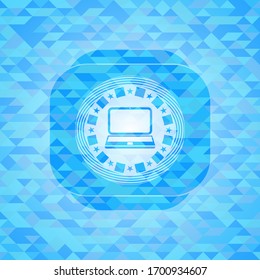 laptop icon inside light blue mosaic emblem