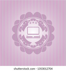 laptop icon inside pink emblem