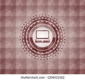laptop icon inside red seamless emblem with geometric background.