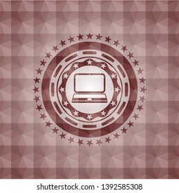 laptop icon inside red seamless badge with geometric pattern background.