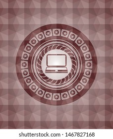 laptop icon inside red seamless badge with geometric pattern.