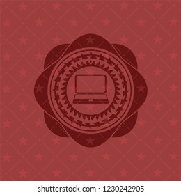 laptop icon inside retro red emblem