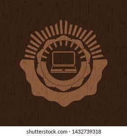 laptop icon inside retro style wood emblem