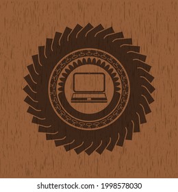 laptop icon inside retro style wooden emblem. 