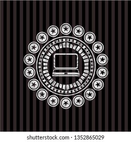 laptop icon inside silver emblem