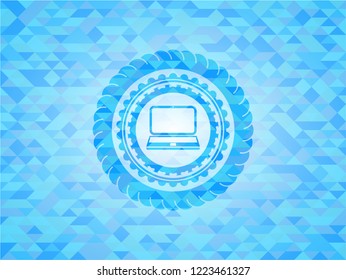 laptop icon inside sky blue emblem with mosaic background