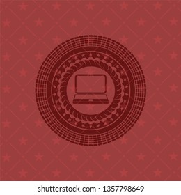 laptop icon inside vintage red emblem