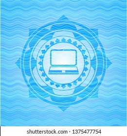 laptop icon inside water representation badge.
