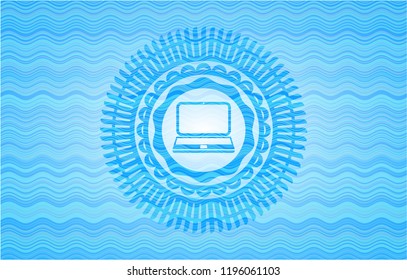 laptop icon inside water wave concept badge.