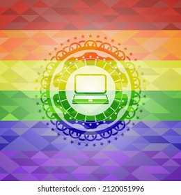 laptop icon on mosaic background with the colors of the LGBT flag. 