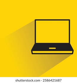 laptop and icon with shadow on yellow background