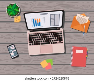 Laptop with infographics on the screen, opened letter, smartphone, plant, stickers, pen, organizer on a wooden table. Flat business illustration. Top view. Work from home.