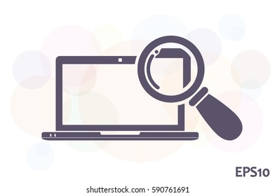 laptop and magnifier icon vector.
