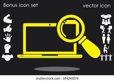 laptop and magnifier icon vector