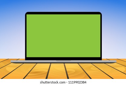 Laptop mockup with green screen for placing advertising screen, poster, wallpaper . Place on the wooden table for advertise