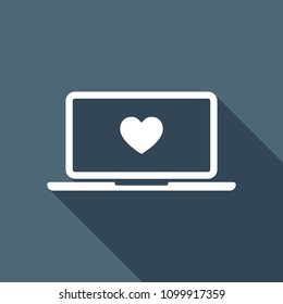 Laptop or notebook computer with heart on screen. Simple icon. White flat icon with long shadow on background