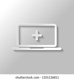 Laptop or notebook computer with medical cross on screen. Simple icon. Paper style with shadow on gray background