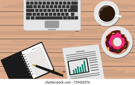 Laptop, notebook, pen, graph chart report, donut and coffee on wooden table