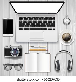Laptop and office stationery on the table. Top view on a businessman workplace. Stock vector graphics.