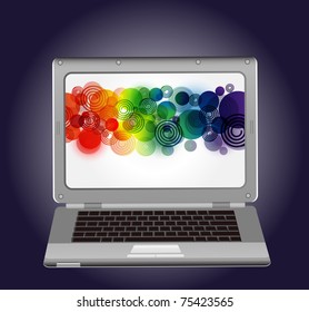 Laptop on the dark background