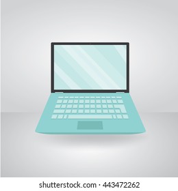 laptop on a gray background with shadow