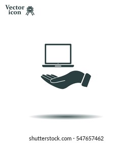 laptop on hand icon, vector illustration. Flat design style