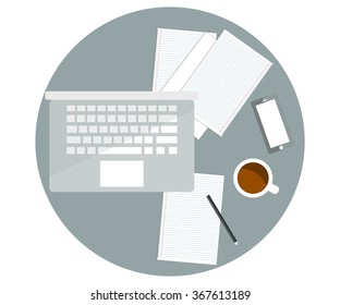 Laptop, paper notes and cup of coffee on the table.