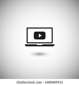 Laptop with play button on screen, vector icon