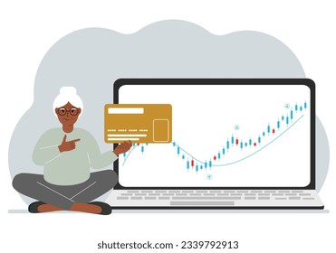 A laptop with a promo page of stock trading or trading on the stock exchange next to a woman holding a plastic card. Financial chart for buying and selling in the stock market.