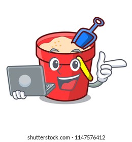 With laptop sand bucket character cartoon