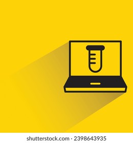 laptop and tube icon with shadow on yellow background
