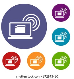 Laptop and and wireless icons set in flat circle reb, blue and green color for web
