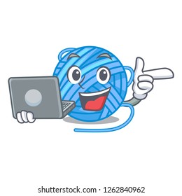 With laptop wool ball in a shape cartoon
