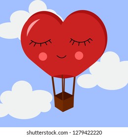 A large balloon in the shape of a heart in the sky