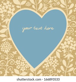 Large blue heart with flowers on a light seamless background. Place for your text. It can be used for decorating of wedding invitations, greeting cards, decoration for bags and clothes.
