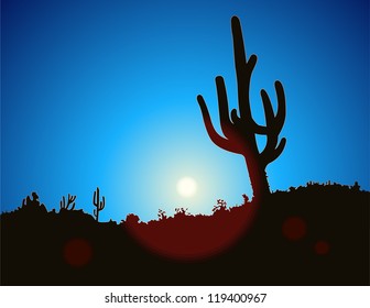 Large catus are slihouetted again a clear blue sky.