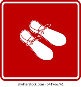 large clown shoes sign