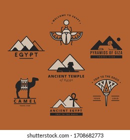 A large collection of vector logos on travel, Egypt and abstract topics. Isolated on brown background Egyptian style logos.