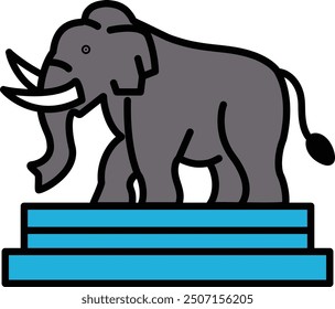 A large elephant is standing on a pedestal. The elephant is the main focus of the image, and it is a symbol of strength and power