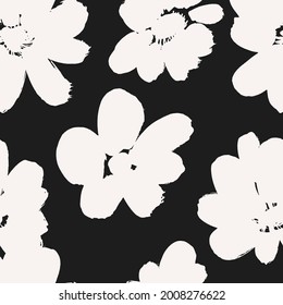 Large flowers with a dry brush on a black beige gray green brown background