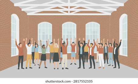 Large group of diverse people standing in a spacious industrial brick room with high ceilings and arched windows with hands raised high.