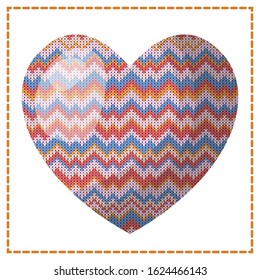 A large, multicolored, knitted heart is isolated on a white background