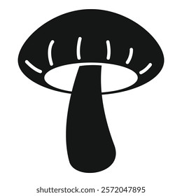 Large mushroom is growing with a thick stem and wide cap in silhouette